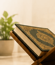 Quran on a wooden stand in a calm study setting